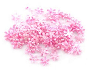 Fiorellini mini puffy in tessuto rosa